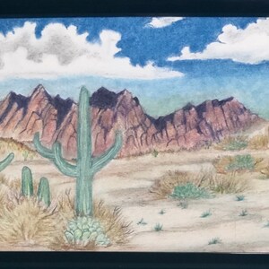 May include: A watercolor painting of a desert landscape with mountains in the background, a blue sky with white clouds, and several cacti in the foreground.