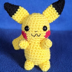 Crocheted Pikachu, With A Crocheted Ball