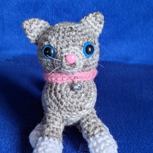 Crocheted Cat, Named Ellie, With A Crocheted Pink Ball