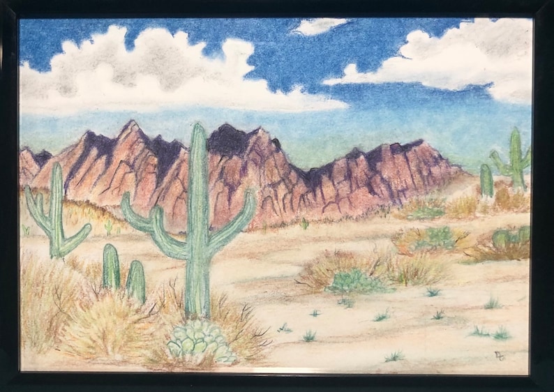 May include: A colorful pencil drawing of a desert landscape with mountains in the background, a blue sky with white clouds, and several green cacti in the foreground.