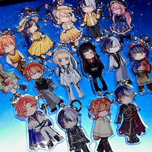 May include: A selection of anime-style character keyrings. Each keyring showcases a unique character design with diverse outfits and hairstyles. The keyrings are made of clear acrylic and have silver-coloured metal key rings.