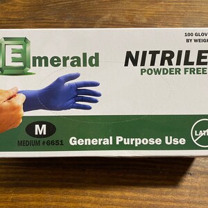 May include: A box of blue nitrile gloves, powder free, latex free, size medium, 100 gloves by weight. The box features a green emerald logo and the text "Emerald Nitrile Powder Free".