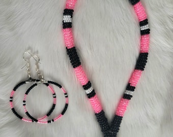 Neon Pink and Black Native Beaded Wristlet and Matching Beaded Earrings.