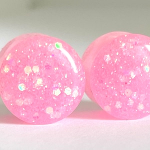 Tapones glamorosos con purpurina