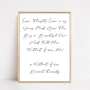 May include: A printable quote in black cursive text on a white background with a gold frame. The quote reads: "Lovin' Thoughts Livin' in my Young Mind Give This Boy a Beautiful View And Tell Him, 'Without fear. Now' - Without fear Dermot Kennedy"