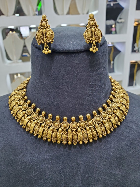 Statement gold jewellery deals