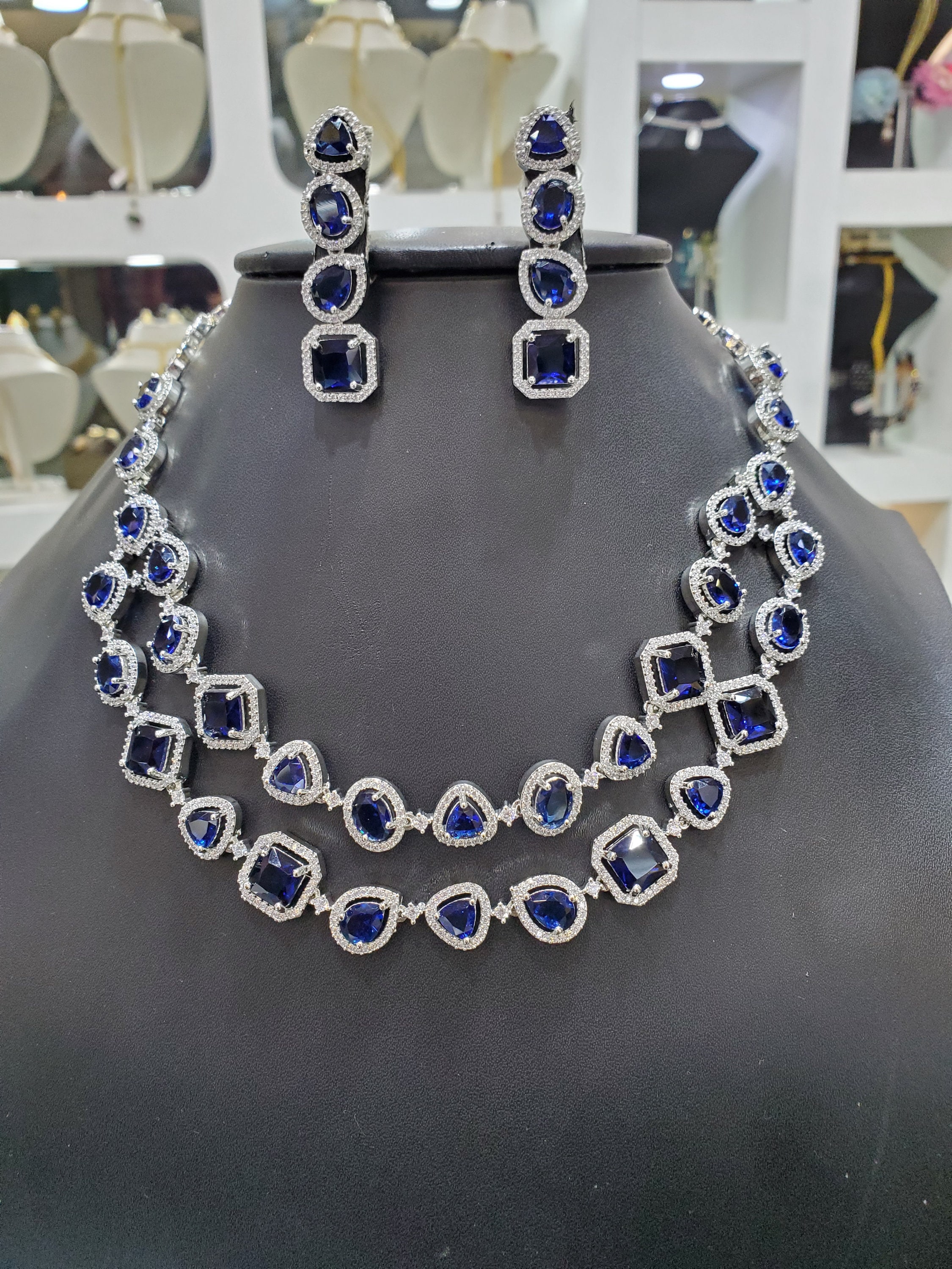 18K White Gold Plated Blue Sapphire Necklace, Tennis Bracelet, and Stu –  Swag For The Low