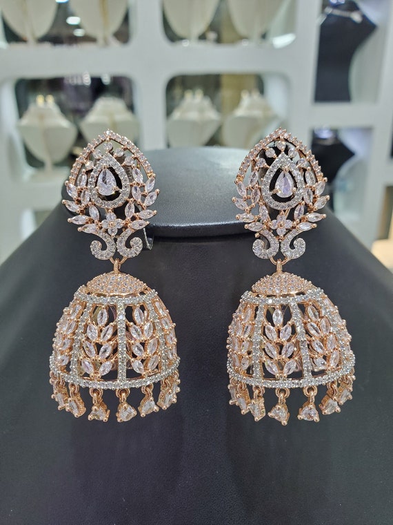 Apsara Golden Cz Jhumka Earrings at Rs 214/pair in Machilipatnam | ID:  2849569955991