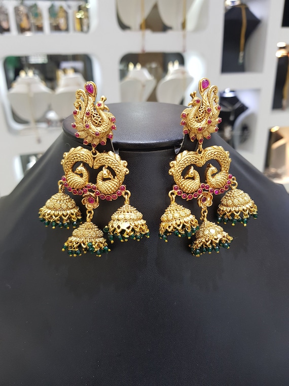 Lovely Peacock Design Gold Jhumkas | Temple jewellery earrings, Indian  jewellery design earrings, Gold bride jewelry