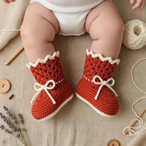 Handmade crochet baby boots made from an easy crochet baby boot pattern for babies aged 9 to 12 months.