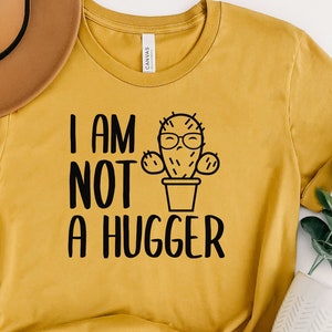 Funny Shirt for Men. I am Not a Hugger Shirt. Funny Gift For Women. Funny Shirt. Funny Gift Shirt. Funny Introvert shirt. Funny Cactus Shirt