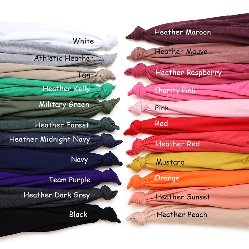 May include: A collection of 18 fabric swatches in various colors, including white, tan, military green, navy, black, heather maroon, heather mauve, heather raspberry, charity pink, pink, red, heather red, mustard, orange, heather sunset, and heather peach.