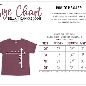 May include: A size chart for a Bella + Canvas 3001T toddler short-sleeve tee. The graphic displays a maroon t-shirt with width and length arrows, instructions on how to measure, and a table listing sizes 2T through 5T with measurements in inches.