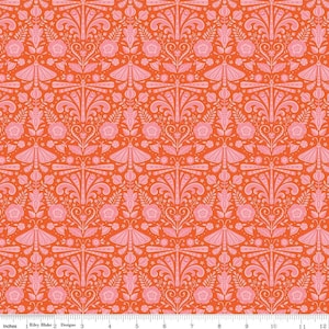 May include: A vibrant orange fabric with a repeating pattern of pink stylized moths, flowers, and decorative elements. The design is symmetrical and detailed, creating a visually rich textile.