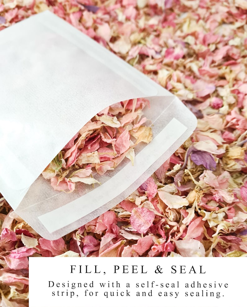 May include: White paper bags with a self-seal adhesive strip. The bags are filled with pink and white flower petals. The text "FILL, PEEL & SEAL" is printed on the bottom of the image.