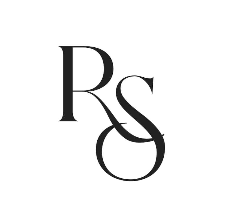 May include: Black and white monogram logo with the letters "R" and "S" intertwined.