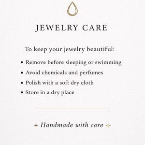 May include: A white informational card titled JEWELRY CARE with a gold droplet icon. It lists instructions: remove before sleeping or swimming, avoid chemicals and perfumes, polish with a soft dry cloth, and store in a dry place. Ends with Handmade with care.