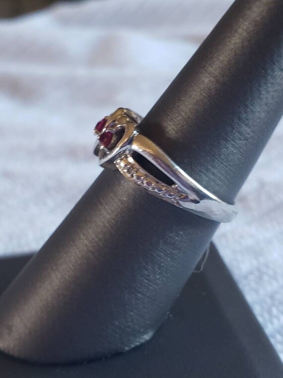 Double heart lab created Ruby ring in Silver. Thi… - image 2