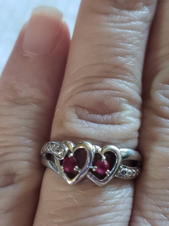 Double heart lab created Ruby ring in Silver. Thi… - image 7