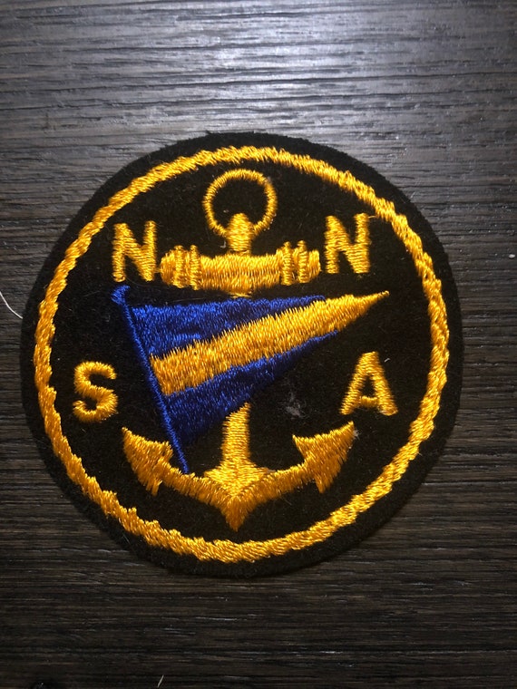 Nautical patch. Anchor and flag
