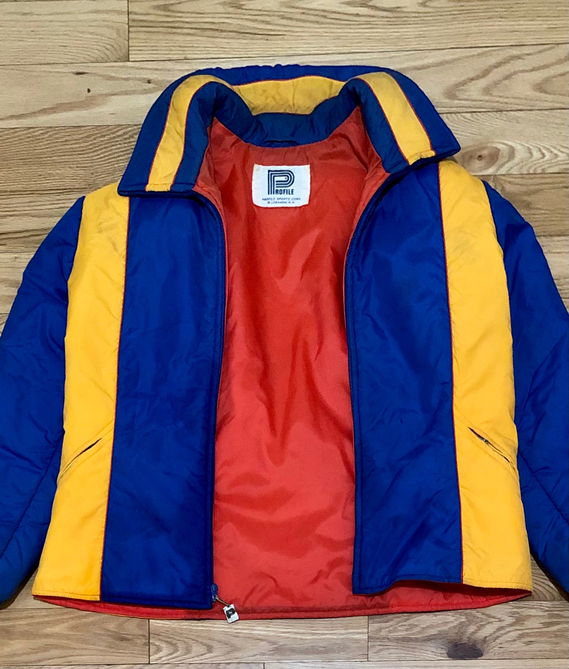 Blue yellow store red jacket