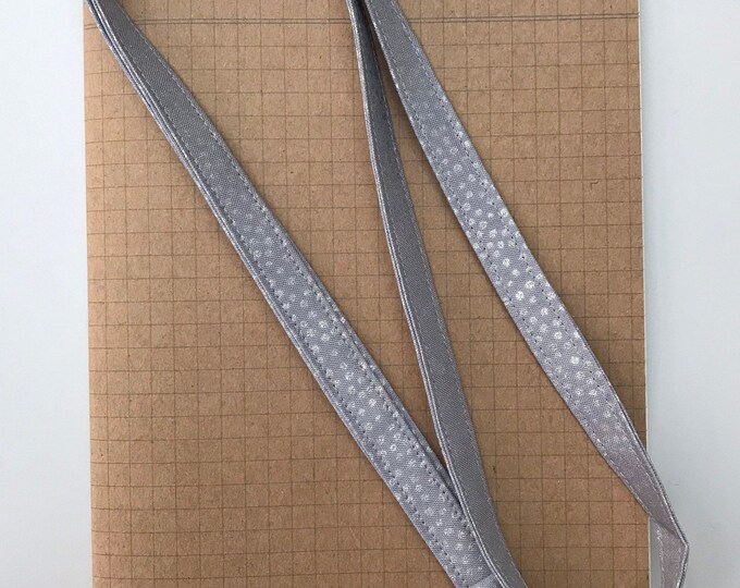 Metallic silver snow fabric lanyard