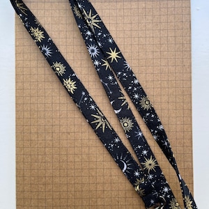Charmed Galaxy Black with gold metallic - fabric lanyard