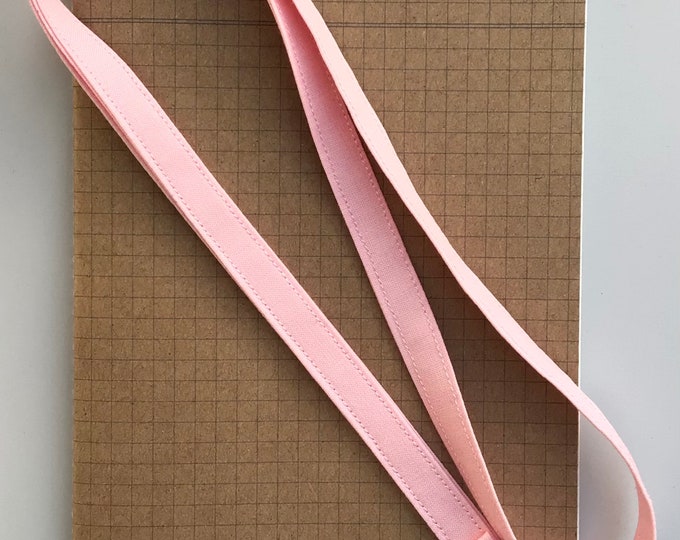 Pastel pink skinny fabric lanyard