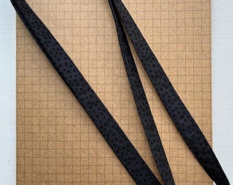 Black on black spotty fabric lanyard