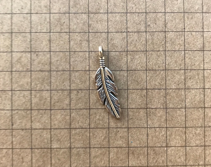 Feather charm