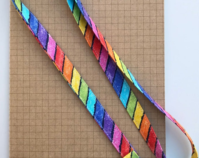 Rainbow diagonal stripe on black fabric lanyard