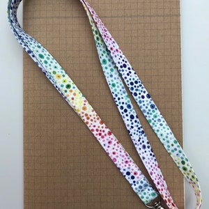 White rainbow spotty fabric lanyard