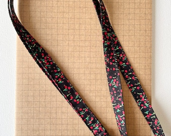 Tiny red rose / tulip on black skinny fabric lanyard