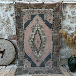 Hand Knotted Turkish Area Rug: Soft Pink & Brown Tribal Medallion