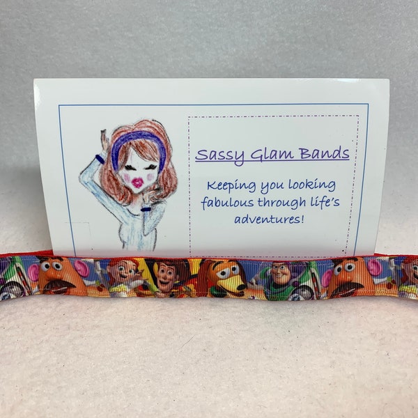 Toy Story themed with Buzz, Mister Potato Head, Jessie, Woody, and Slinky Dog on grosgrain 7/8" width headband