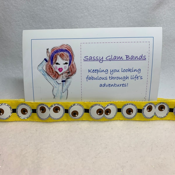 Googly eyes with foil accents on yellow grosgrain - inspired by the movies starring the funny little yellow guys 7/8" width headband