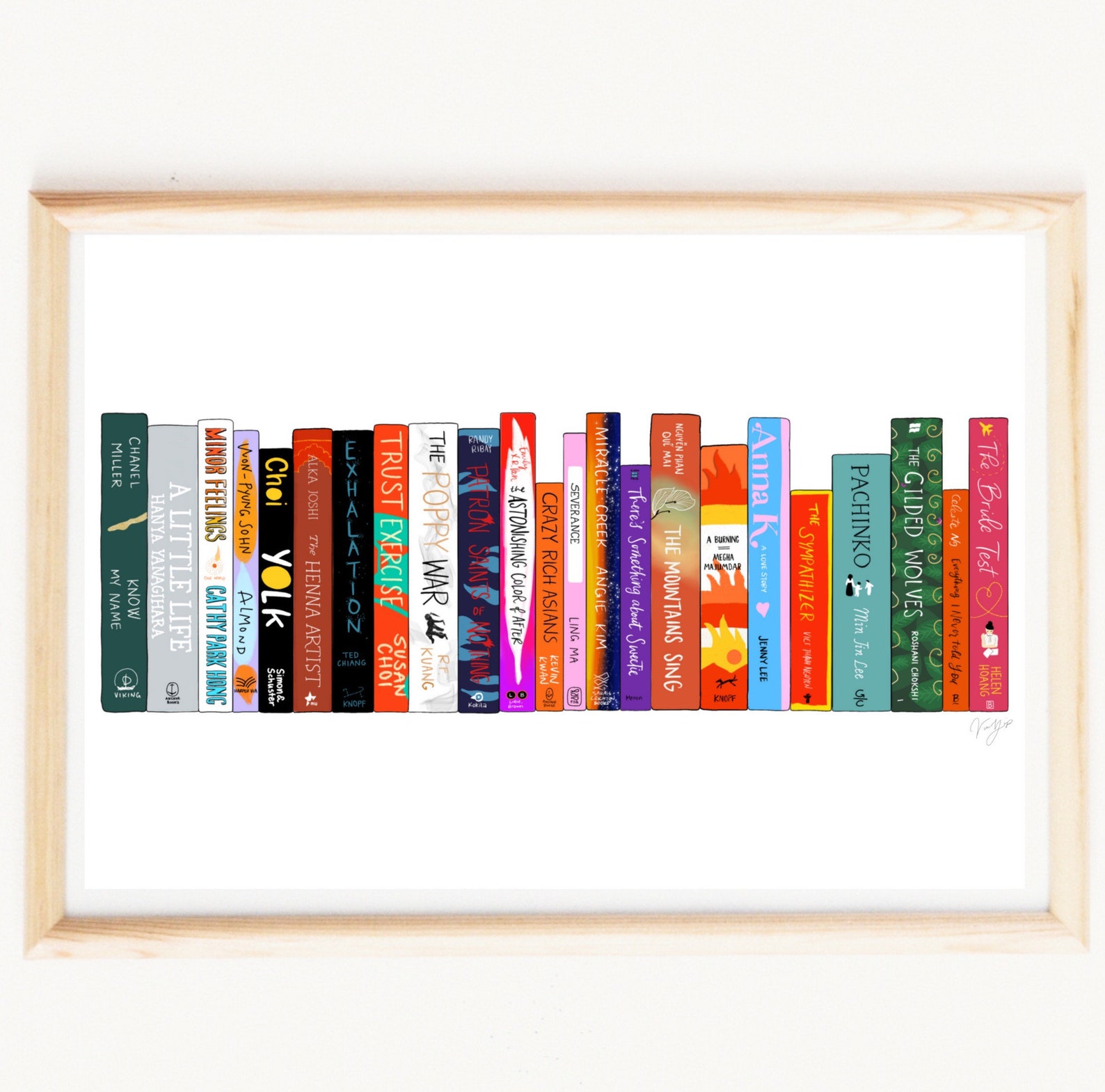 framed picture of books by Asian authors