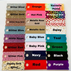 May include: A color chart featuring various acrylic swatches. Colors include glitter silver, gold, rose gold, blue, purple, red, pink, and chunky gold glitter. Solid colors are orange, hot pink, baby blue, baby pink, navy, and red. Other colors are rainbow pastel, rainbow bold, daisy, teal, green, black, and purple.