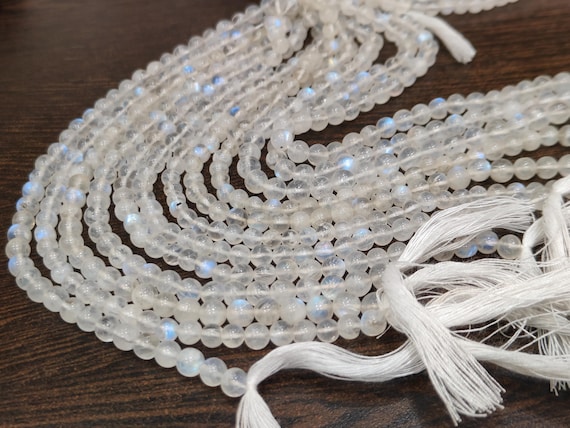 Natural white rainbow moonstone 4 to 6 mm round plain smooth beads sold per strand 8 inches