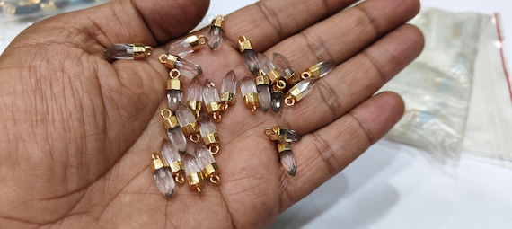 2Pc.- Natural Rock Crystal Quartz Tiny Bullet Charm Pointer Pendant  Single Loop Connector Charm  Electroplated approximately 0.5 inch long