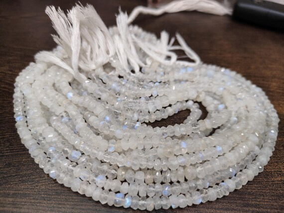 Natural white Rainbow Moonstone Rondelle Faceted Beads 5 to 6mm Strand 8 inches long High Quality Blue Flashy Beads Wholesale Prices