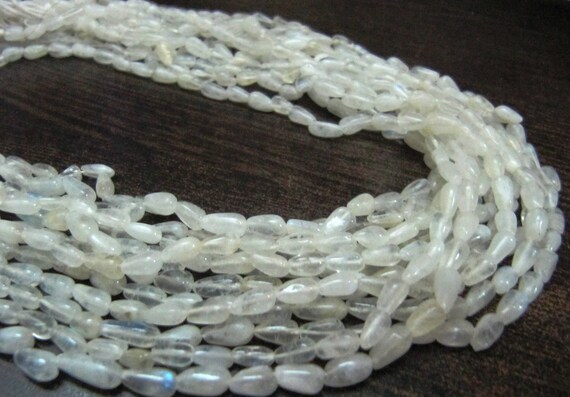 Natural White Rainbow Moonstone Drop shape  Plain Smooth Beads  Strand 13 inch long High Quality Blue Flashy Beads Wholesale Prices