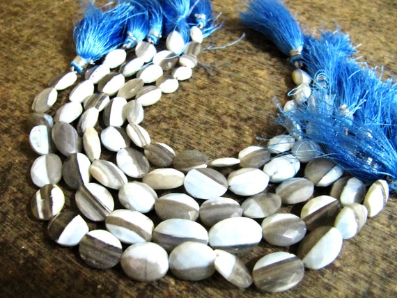 Natural Bolder Opal Faceted Oval Shape Briolette Size  10x14mm Strand 8 Inch Long .sold Per strand