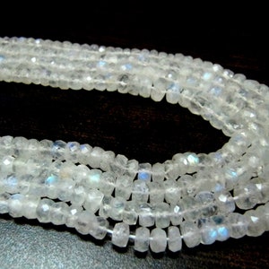 Natural white Rainbow Moonstone Rondelle Faceted 4to7mm Graduated Beads Strand 8 inches long High Quality Blue Flashy Beads Wholesale Prices