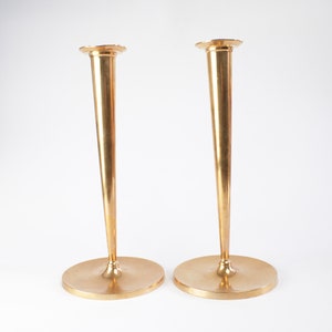 Tall candle holders, unknown maker or company, probably made around the 1920s