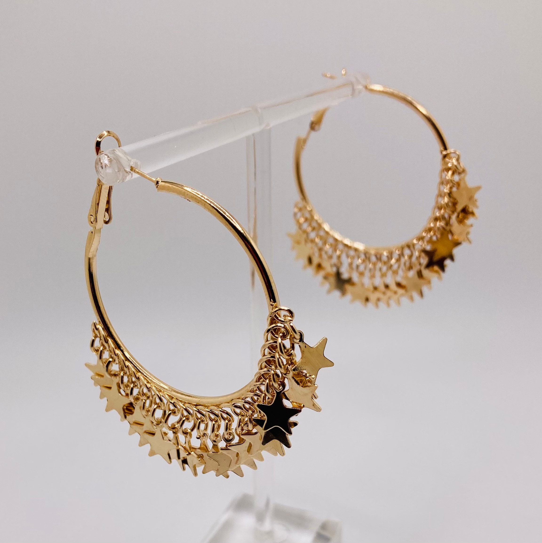 Gold 60MM Star Hoop Earrings | Claire's US