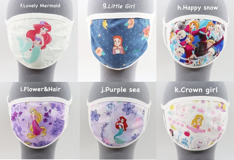 May include: Set of 10 colorful fabric face masks featuring various Disney characters, including Ariel, Rapunzel, Snow White, and Elsa. Each mask has a white border and a different design.