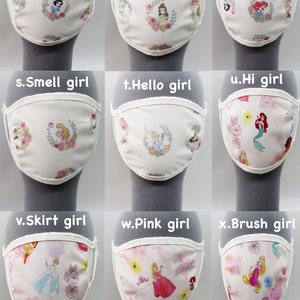 May include: Nine white face masks with different Disney princess designs. Each mask has a white elastic band and a white border. The masks feature princesses like Snow White, Belle, Ariel, Cinderella, and Aurora.