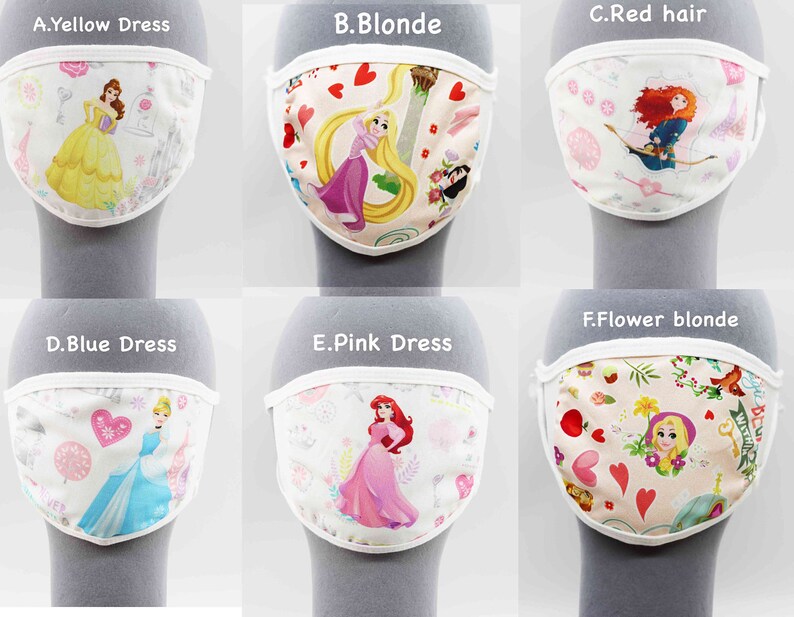 May include: Six different face masks with white borders and various Disney princess designs. The masks feature princesses like Belle, Rapunzel, Merida, Cinderella, Ariel, and Rapunzel with flowers.