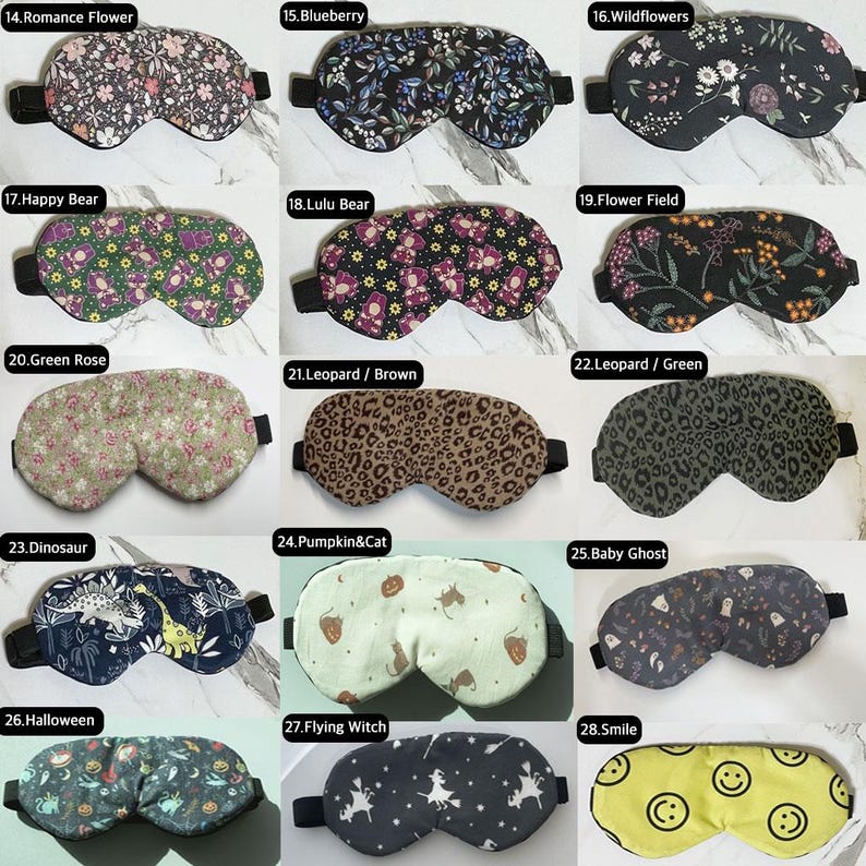 Op de afbeelding: Een verzameling van 15 oogmaskers met verschillende patronen en ontwerpen. De oogmaskers zijn gemaakt van zacht materiaal en hebben een elastisch bandje om comfortabel om het hoofd te passen. Sommige van de patronen omvatten bloemen, dieren en geometrische vormen.